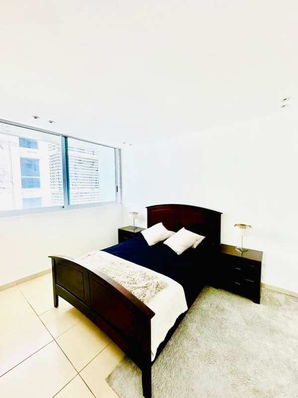 Stylish modern kitchen with granite counters and stainless appliances at PH BICSA Panama