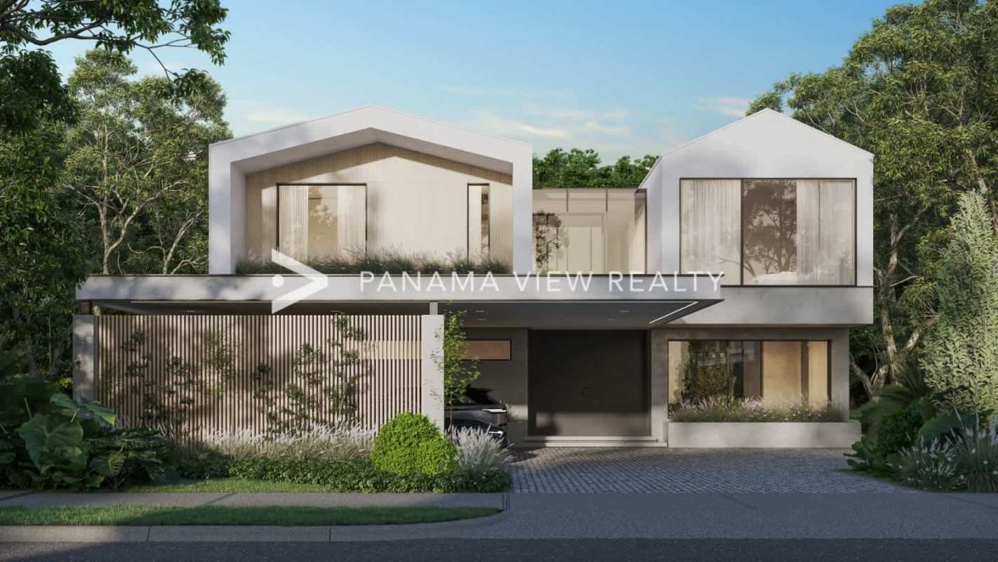 Modern two-level house facade with balconies and garden in Peninsula Estates Santa Maria