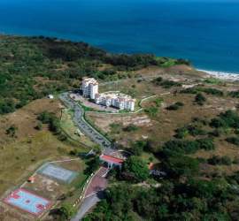 Aerial photo of Playa del Sol condominiums with pools tennis court and ocean access San Carlos Panama