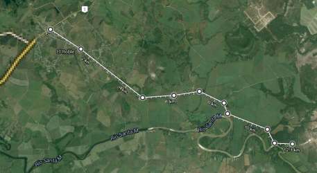 Satellite image showing access road, river, vegetation in El Roble Panama farmland