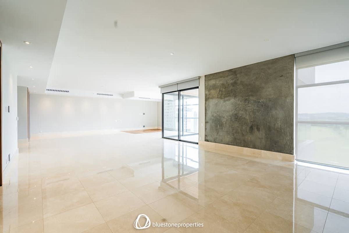 High-end kitchen with island, built-in appliances, modern cabinetry in luxury apartment rental Santa Maria Golf Panama