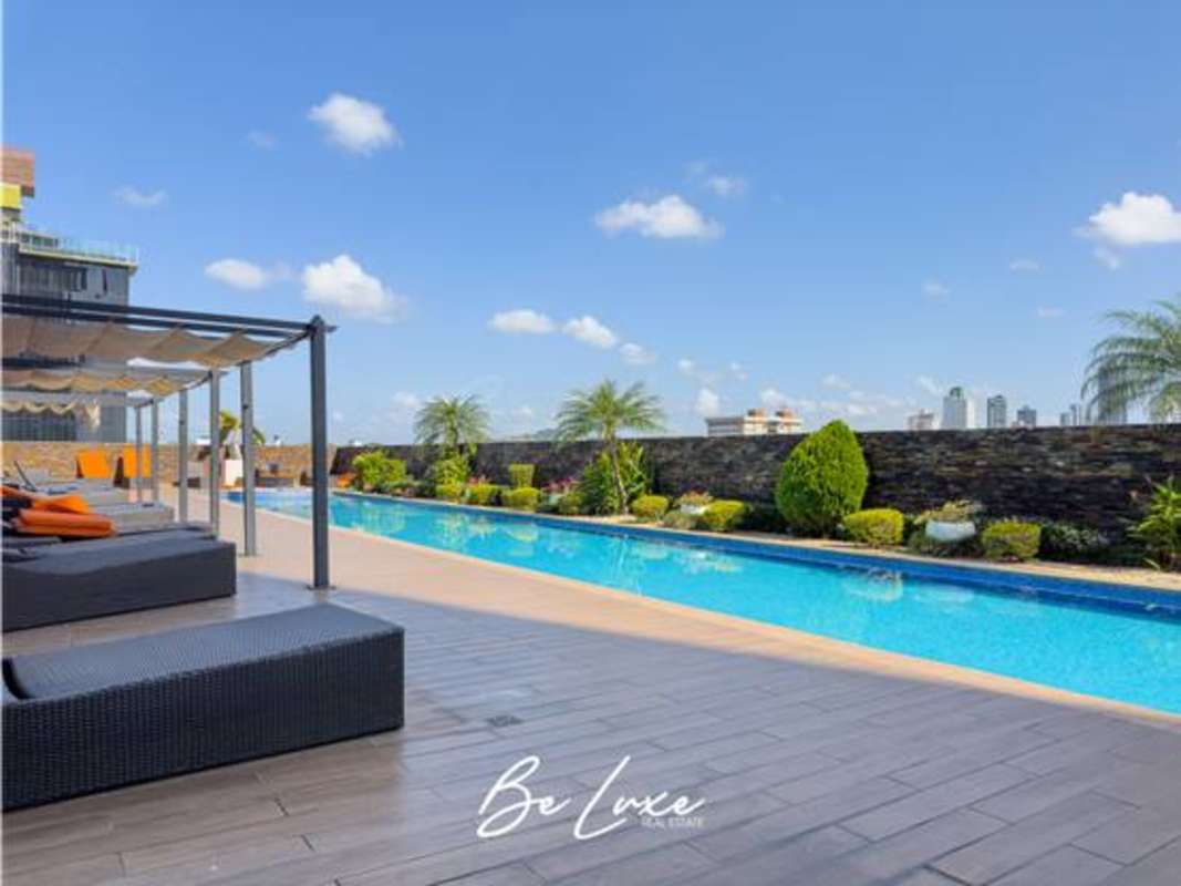 Rooftop infinity pool with panoramic ocean and skyline views in PH Rivage Tower Panama City