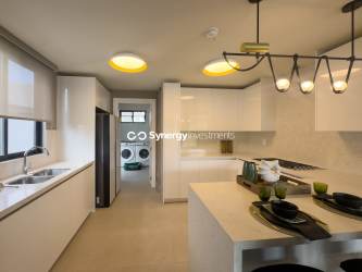 Bright bedroom with built-in closet and large window in residential duplex Panama Pacifico