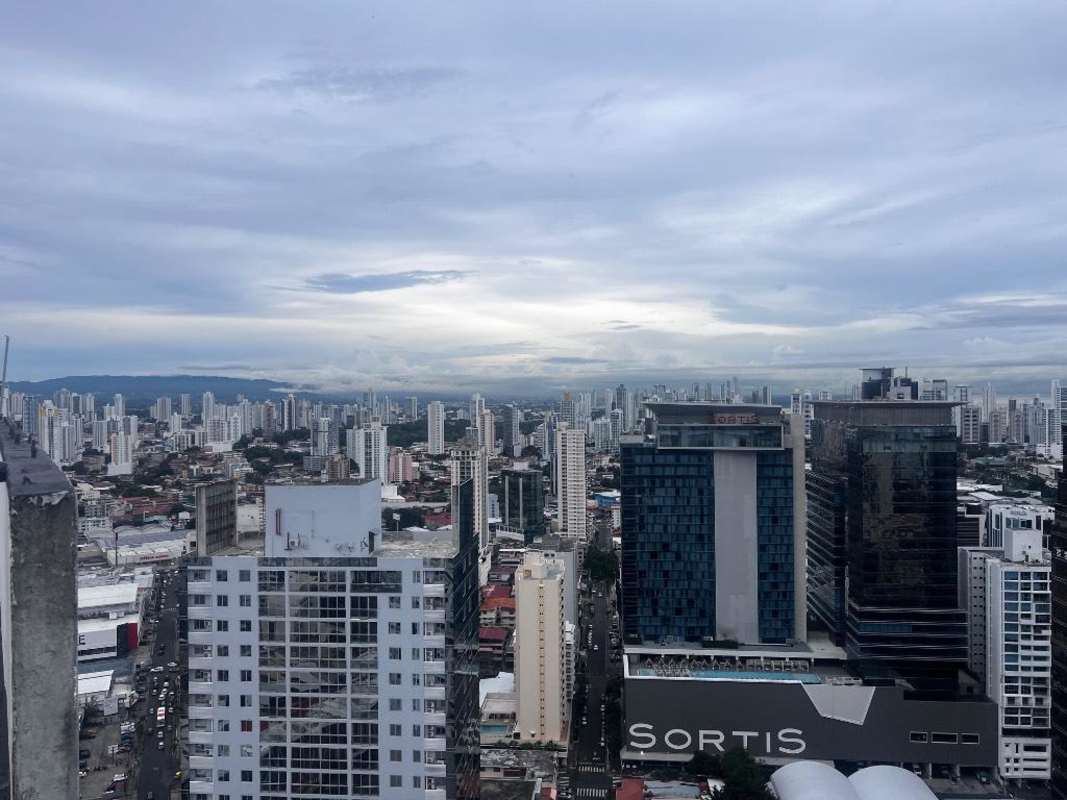 Aerial view Panama City skyline with Worldwide Plaza towers in foreground