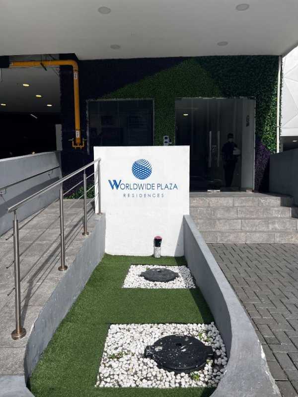 Modern bathroom with decorative tile, walk-in shower at Worldwide Plaza Panama