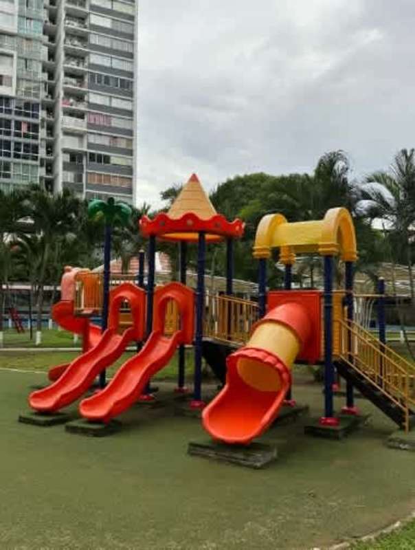 Children playground with slide tunnel climbing structures in PH Central Park Panama City