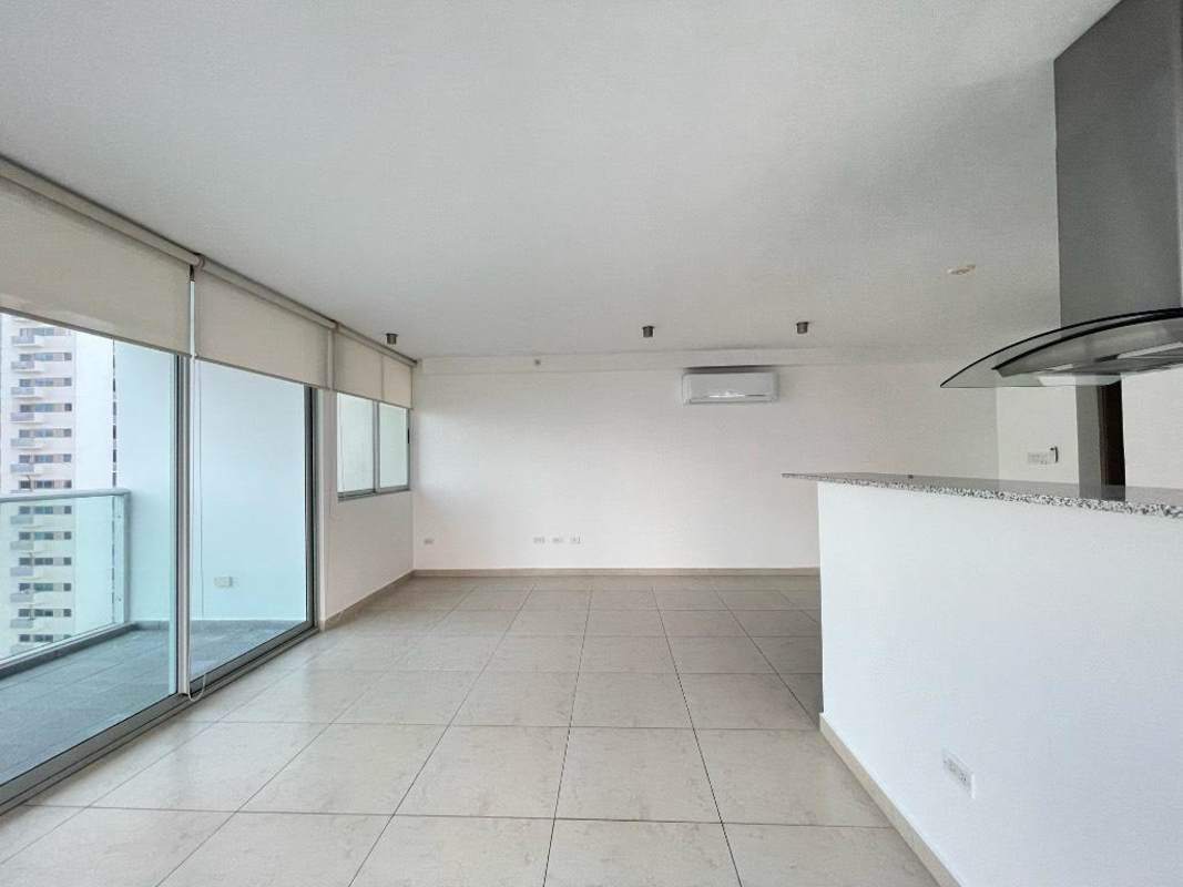 Modern balcony with glass railing and spectacular Pacific Ocean and skyline views in PH Lumiere Costa del Este Panama