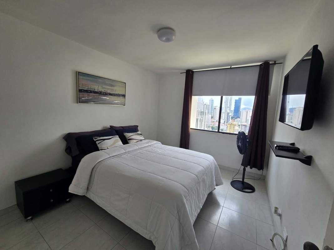 City skyline view from bedroom window at PH Obarrio Suites Obarrio