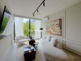 Spacious peninsula kitchen with granite countertops and appliances