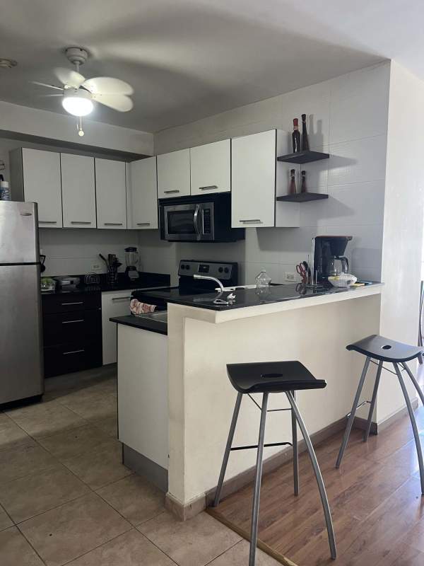 Modern loft kitchen with granite counters, stainless appliances PH Bayfront Tower Panama City