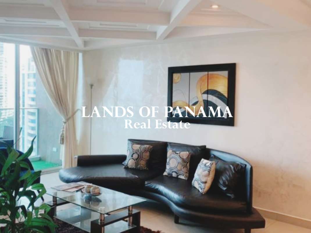 Dining room with large windows overlooking Punta Pacifica skyline in PH Pacific Sea Panama City