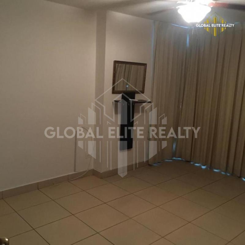 Bedroom with large window and ceramic tile floor PH Pueblo Nuevo Panama
