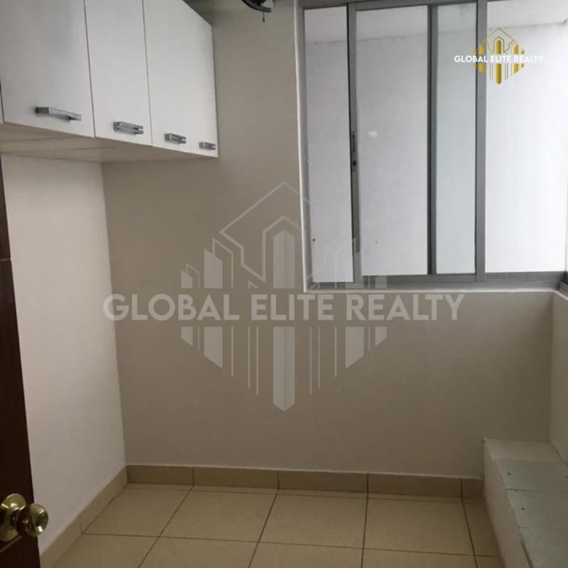 Utility room with overhead cabinets and tile floor PH Pueblo Nuevo Panama