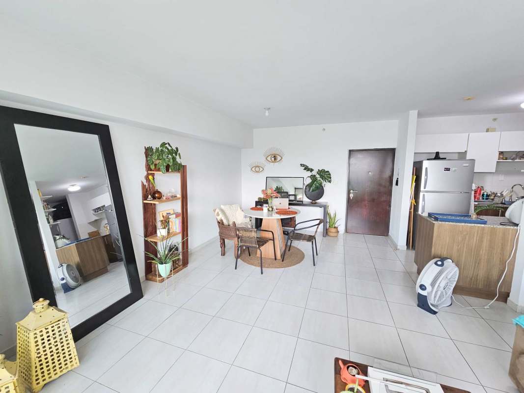 Bedroom with large window and city skyline views PH Trinity El Cangrejo Panama