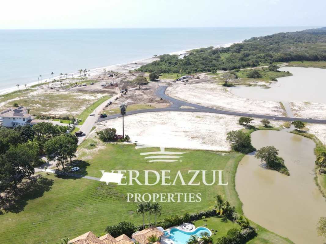 Prime beachfront development site at Buenaventura Panama with sandy plots, pool, coastline and vegetation