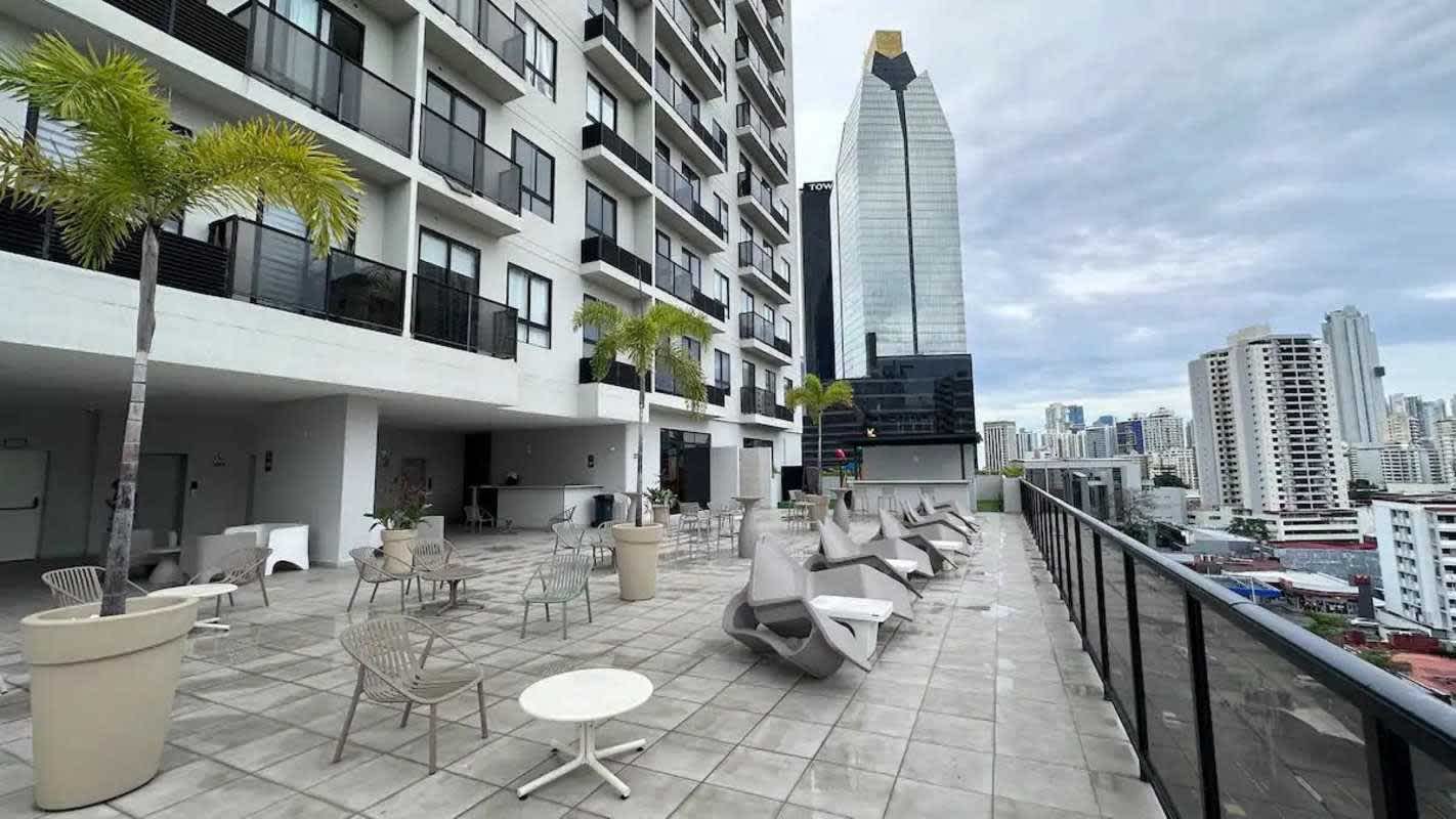 Condo gym with exercise machines and large windows PH Costa Pacifica Panama