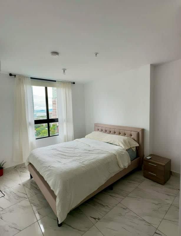 Minimalist bedroom with natural light at PH Costa Pacifica Calle 50 Panama