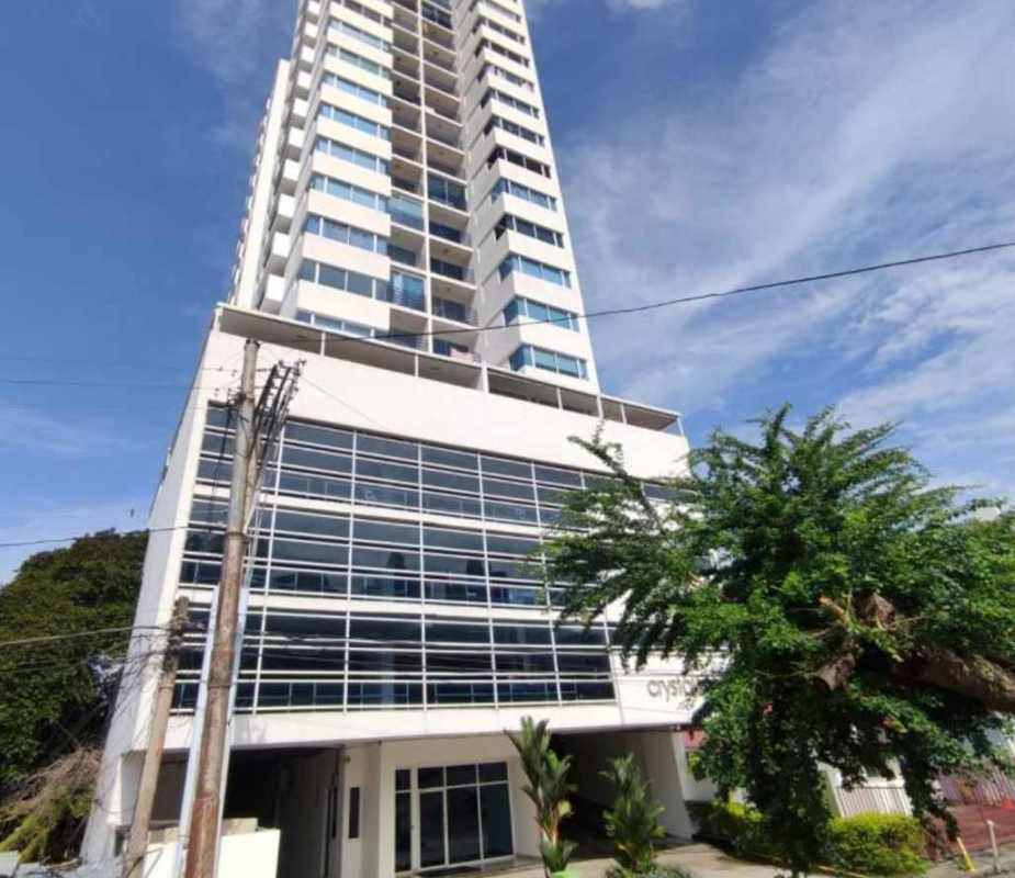 Modern high-rise building PH Crystal Blue with balconies and glass facade Panama City