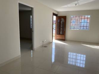 Kitchen with granite tops and natural morning light in Costa Oeste house for rent