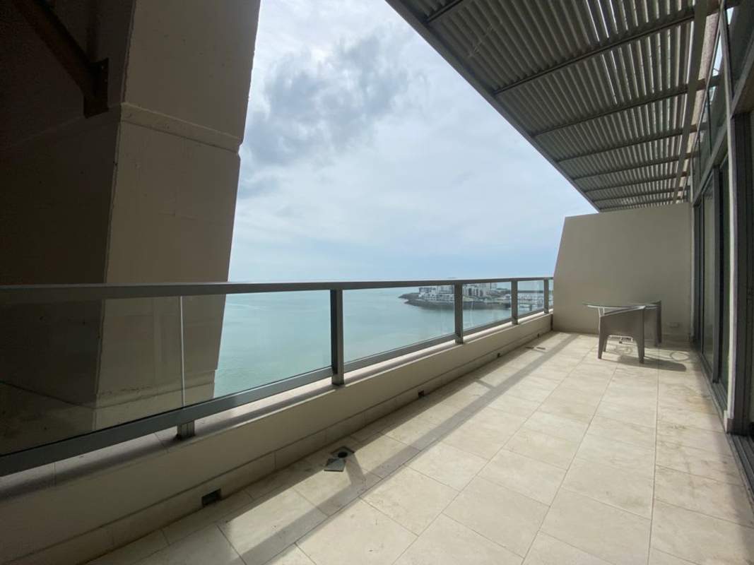 Modern living room with marble floors and oceanfront views for rent JW Marriott Panama