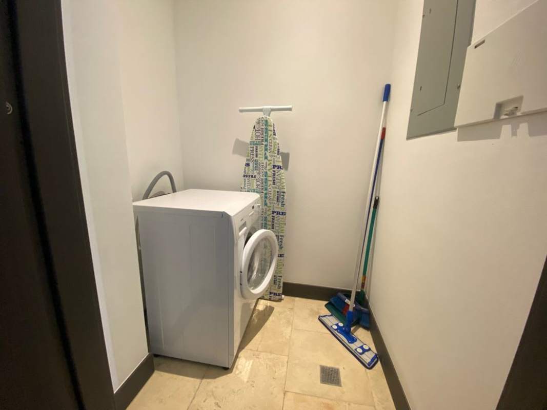 Furnished bedroom with king bed and panoramic Pacific view rental JW Marriott Panama