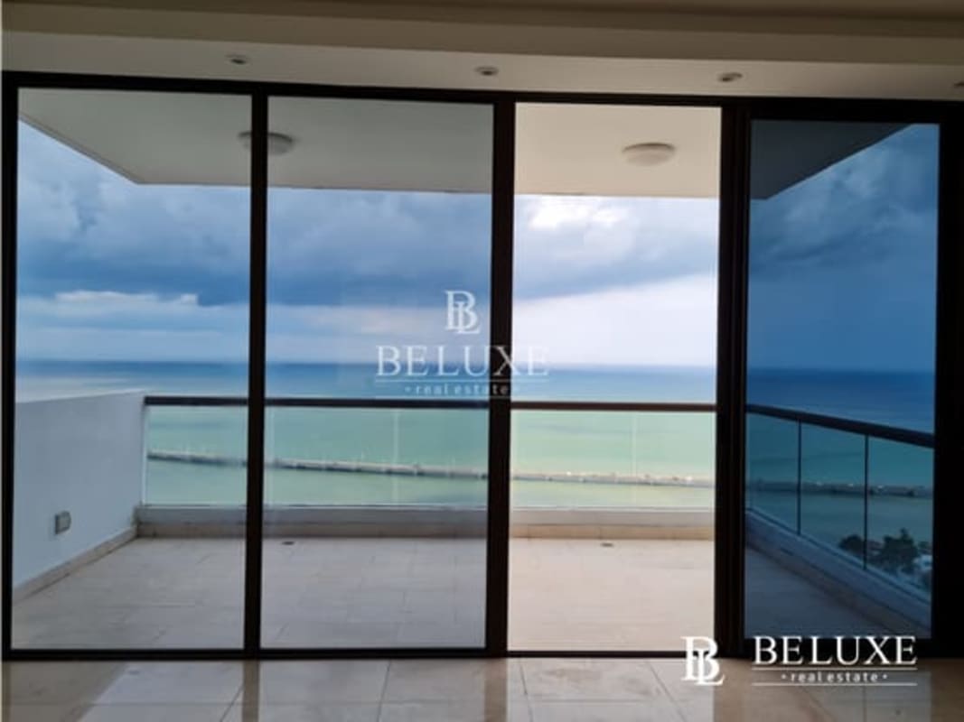 Modern balcony with panoramic Pacific Ocean views in PH Dal Mare