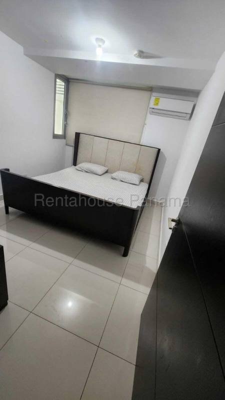 Minimalist bedroom with upholstered bed and AC in PH MIDPARK Carrasquilla