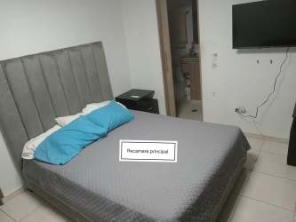 Covered terrace bar area in backyard at Quintas del Pacífico house for sale