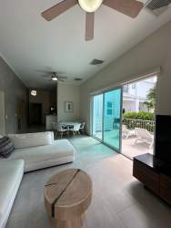 Bright living and dining area with sliding doors to terrace Bijao Beach Club Panama