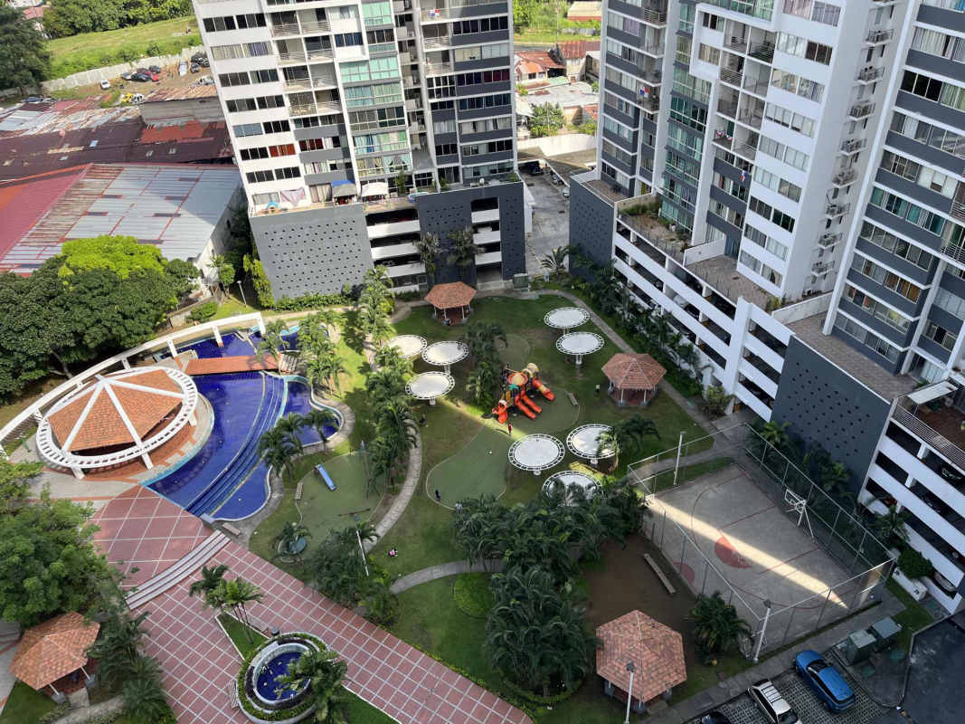 Aerial view of Central Park condo community with gardens playground sports courts at Torre Tribeca Panama