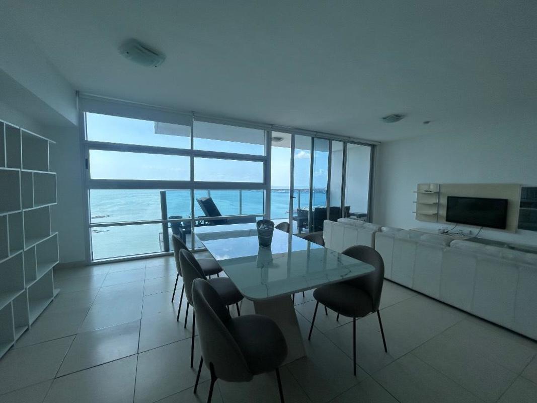 Living area with oceanfront balcony and panoramic views in PH Waters Panama
