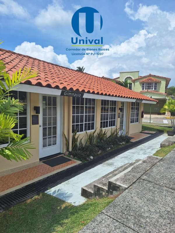 Exterior of community gym and event space with red tiled roof in Albrook Gardens Panama