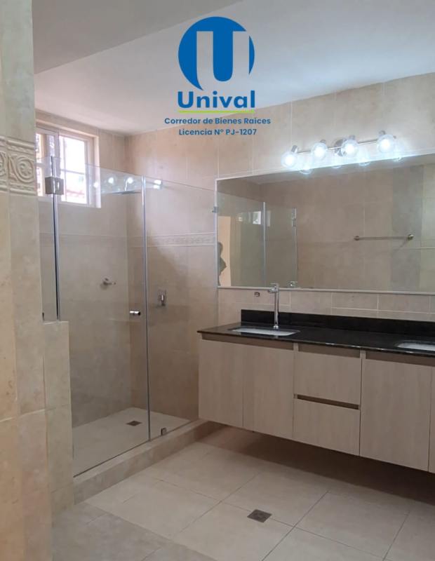 Remodeled double sink bathroom with granite tops, glass shower Albrook Gardens Panama