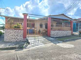 Laundry area with washer hookup, utility sink, ventilated window in Villa Zaita Panama