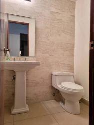 Large wrap-around balcony with pool and garden views PH River Valley Panama Pacifico