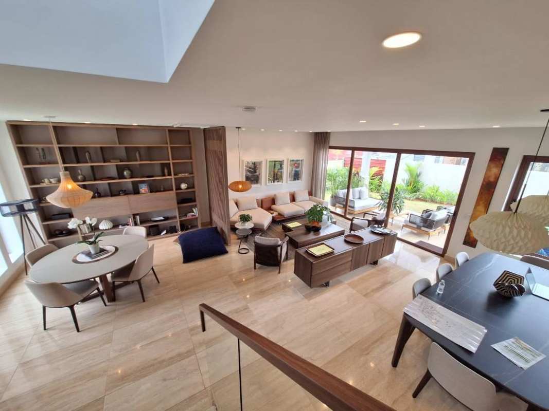 Spacious dining area with floor-to-ceiling windows overlooking private garden in Santa María Panama