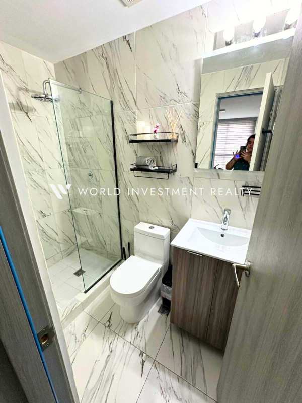 Rooftop infinity swimming pool with panoramic ocean view at PH El Botánico Bella Vista Panama City