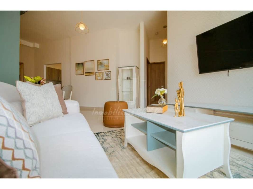 Bright open living and dining room in Bella Veduta condo Panama City