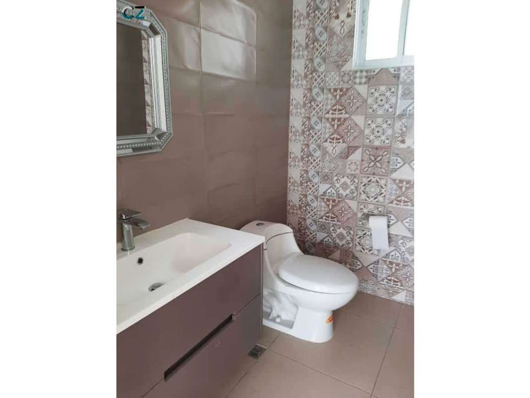 Spacious master suite with garden view in Panama City residential estate