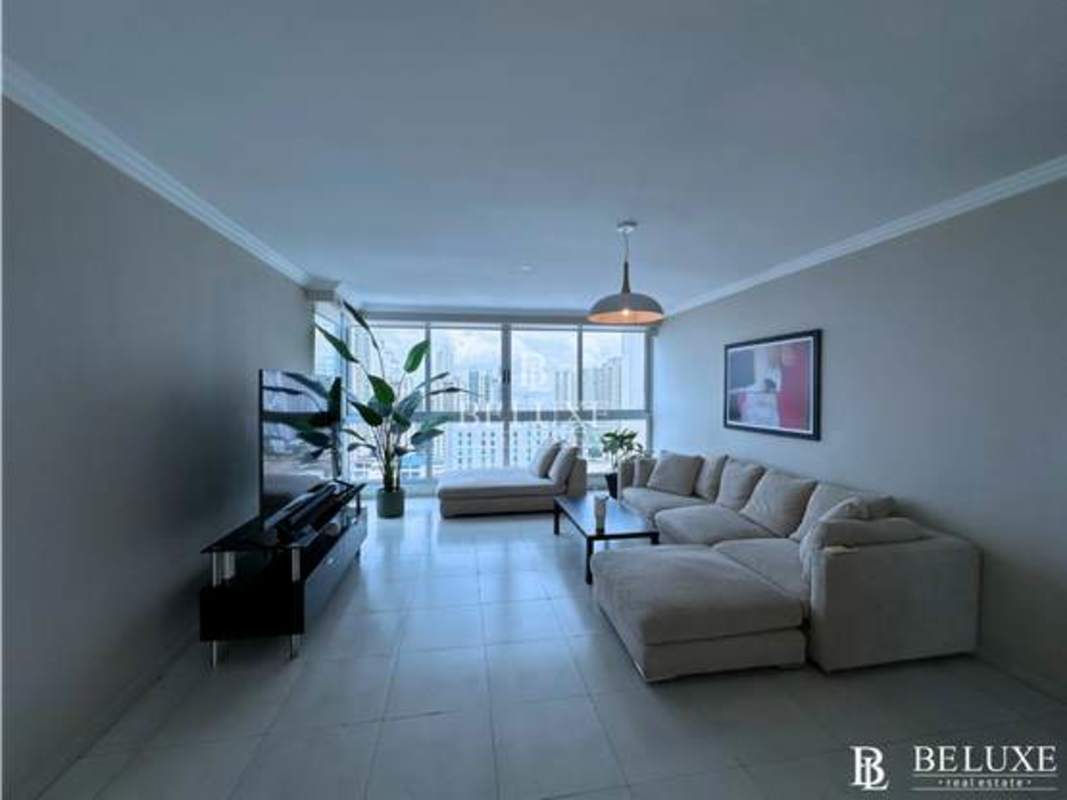 Bedroom with panoramic windows and skyline view in PH Marina Plaza San Francisco Panama furnished