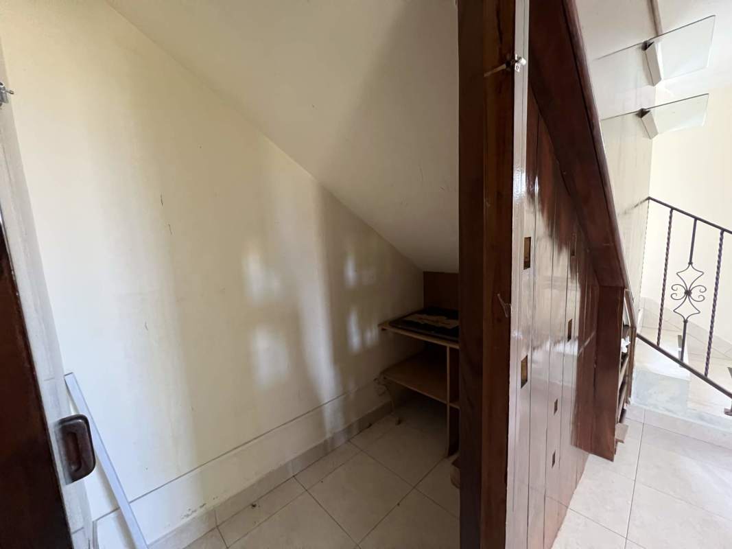 Bedroom featuring built-in wardrobe and AC unit Dorado Lakes Panama City