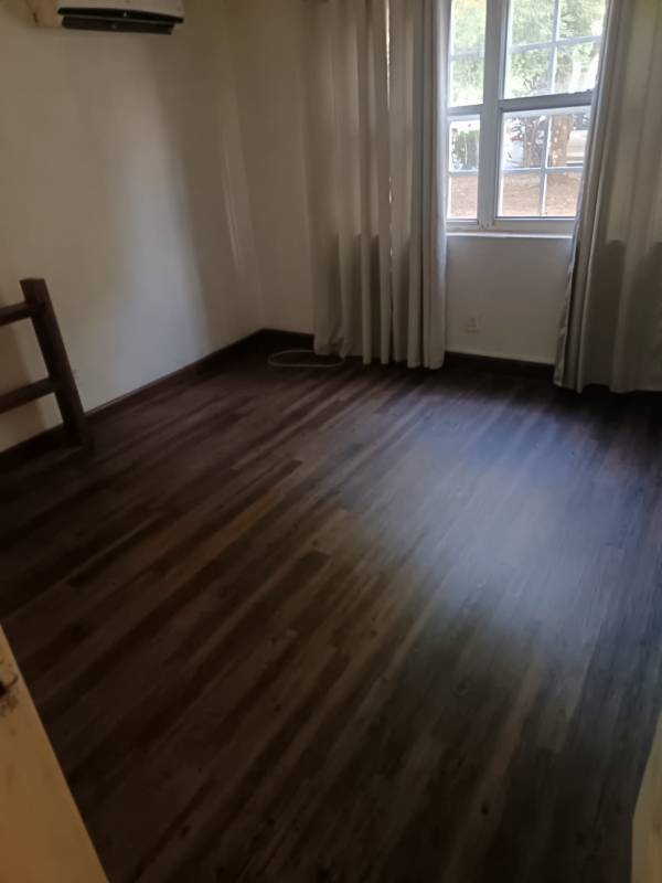 Open kitchen area with stove and refrigerator for rent Clayton Residences Panama City