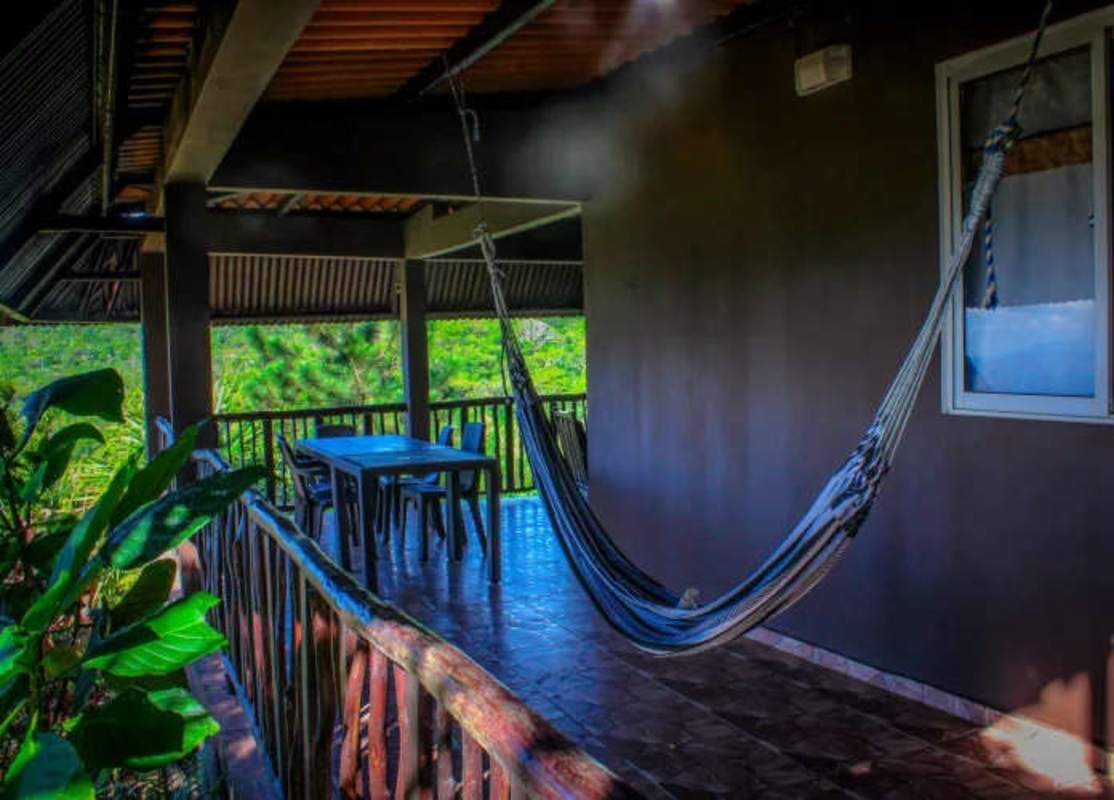 Furnished guest cabin with terrace views at Eco Lodge Cerro Azul Panama