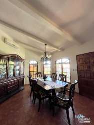 Open concept living and dining space with high ceiling in David Chiriquí condo