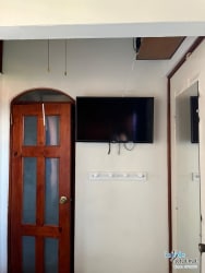 Bathroom with pedestal sink and walk-in shower traditional style condo David Panama