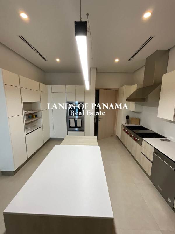 Spacious master bedroom marble floors walk-in closet ocean view windows Ocean Reef Islands Panama