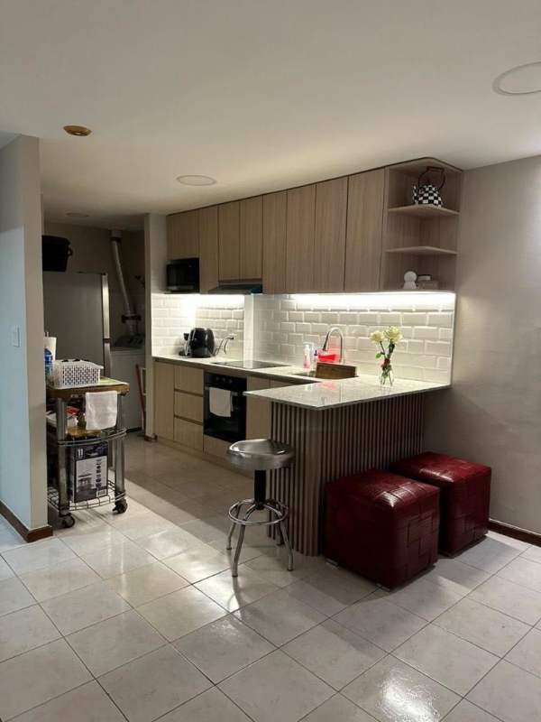 Remodeled kitchen granite countertop light wood cabinets PH Albrook Park Tower 3 Panama