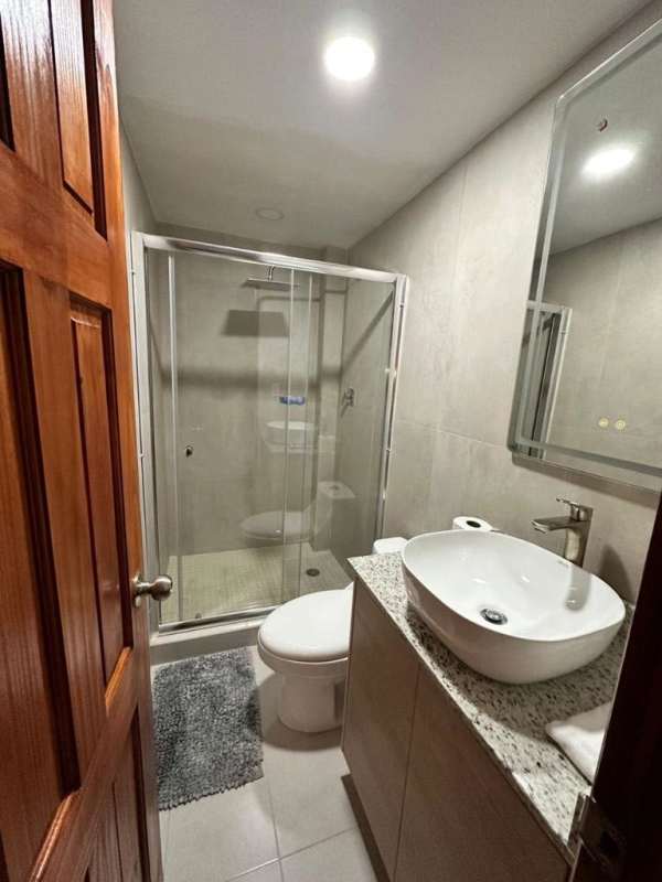 Modern bathroom with vessel sink granite countertop glass shower PH Albrook Park Tower 3 Albrook Panama