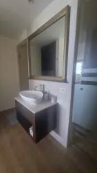 Modern ceramic bathroom with shower in Playa Blanca Town Center Loft Rental