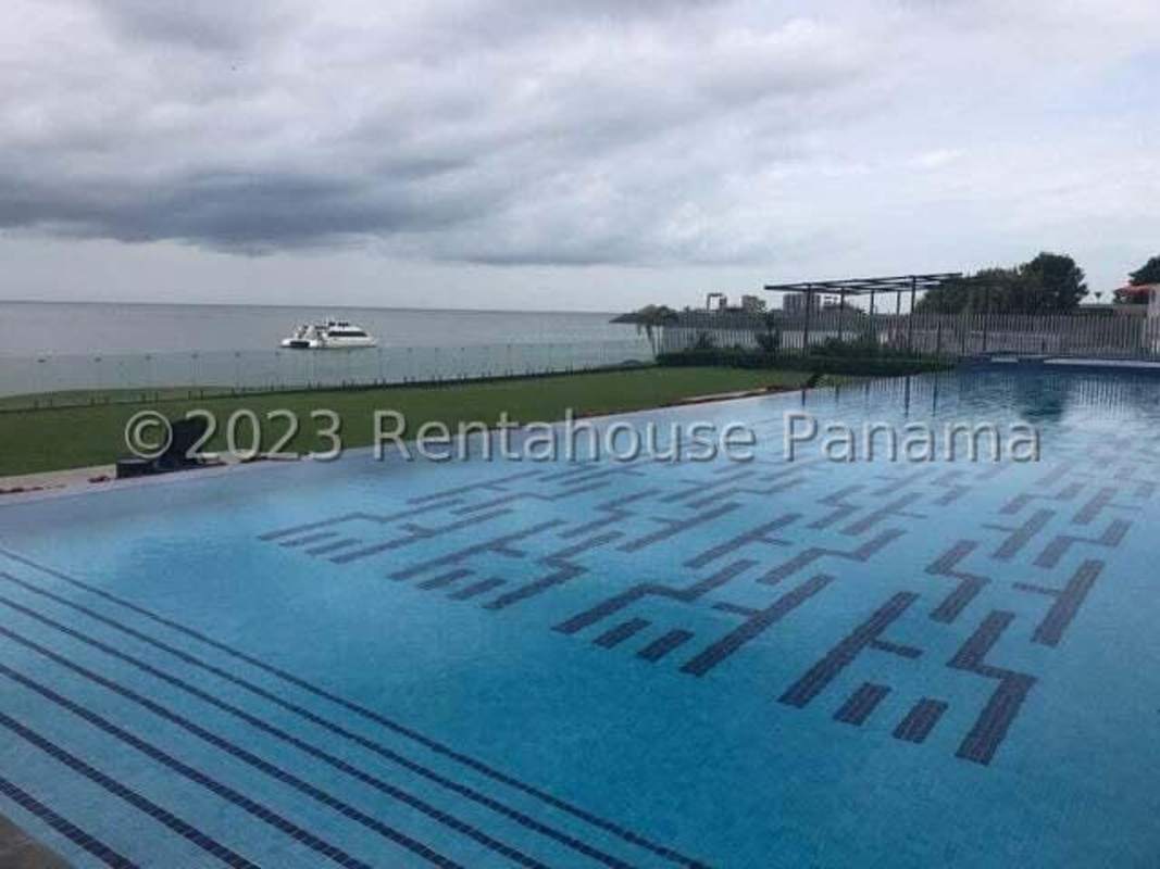 Modern infinity pool with ocean backdrop at PH Aqualina luxury building Panama City